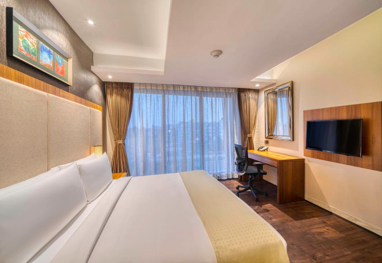 Holiday Inn Kolkata Airport By Ihg Exterior foto A room at the hotel