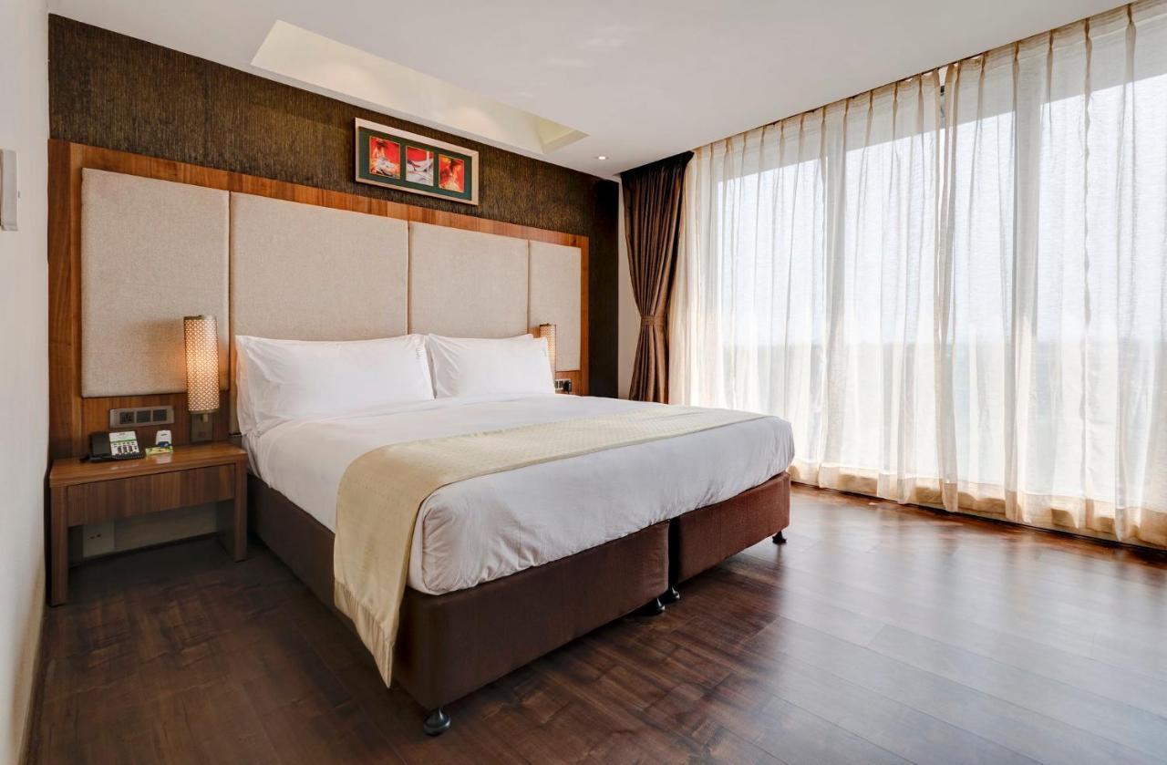 Holiday Inn Kolkata Airport By Ihg Exterior foto A bedroom at the hotel